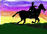 Silouette of a man on a horse against a sunset