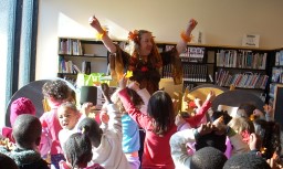 Su Eaton leading children in dance