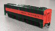 Hunter-green & orange engine with a New Haven decal